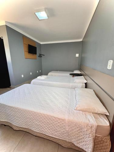Postel nebo postele na pokoji v ubytování Hotel Boa Viagem