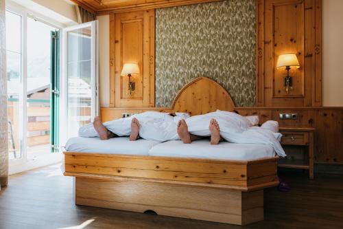 Anthony´s Alpin Hotel Garniにあるベッド