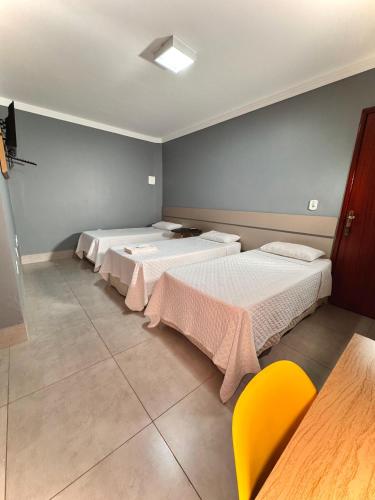 Postel nebo postele na pokoji v ubytování Hotel Boa Viagem