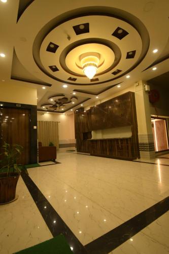 Fotografie z fotogalerie ubytování Hotel Adhunik v destinaci Fatikrāi