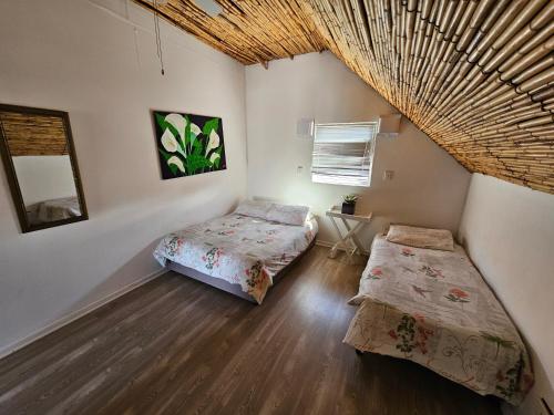 Ένα ή περισσότερα κρεβάτια σε δωμάτιο στο Mykonos Holiday Home