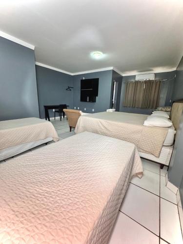 Postel nebo postele na pokoji v ubytování Hotel Boa Viagem