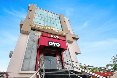 a building with a new oxo sign on it at Hotel O New Tulip Santragachi Junction in Kolkata