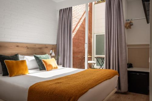 Ένα ή περισσότερα κρεβάτια σε δωμάτιο στο BYPILLOW House