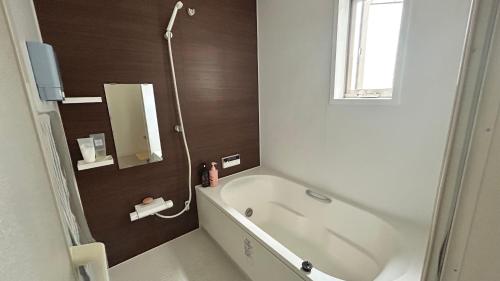 Ένα μπάνιο στο marui home hibino guesthouse