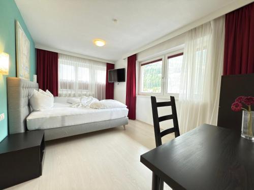 Una cama o camas en una habitación de Haus Pia by A CASA