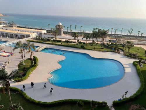 Kolam renang di atau dekat dengan Apartment of porto Sokhna
