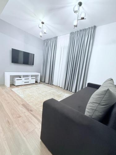 Et tv og/eller underholdning på Harmony Apartments Airport