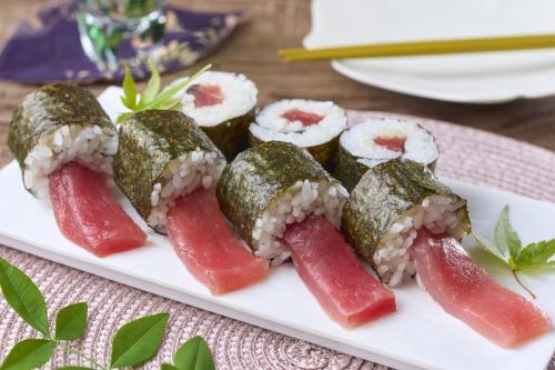 a white plate with sushi on a table at TAOYA Nachikatsuura in Nachikatsuura