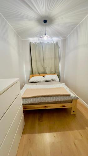 Postel nebo postele na pokoji v ubytování Przyjazny Kąt