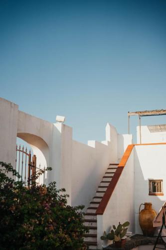 a set of stairs leading up to a building at Luxery Resort Triglie in Crispiano