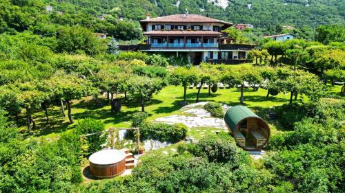 an aerial view of a house with a garden at Hotel Querceto Wellness & Spa - Garda Lake Collection in Malcesine