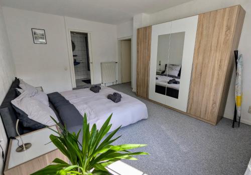 Ένα ή περισσότερα κρεβάτια σε δωμάτιο στο Apartment mit eigenem Eingang und eigener Terrasse