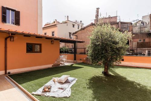 The Best Rent - Peaceful oasis with garden near the Colosseum