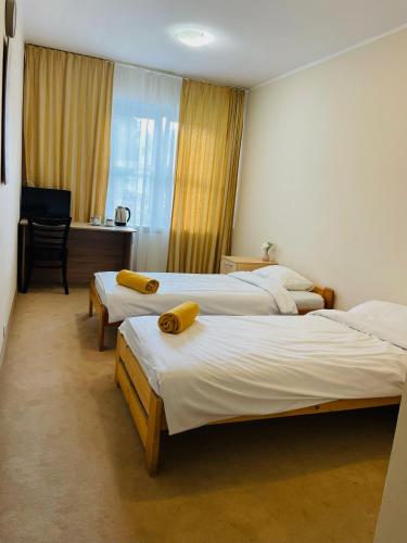 Katil atau katil-katil dalam bilik di Przystań Ostróda - pokoje i apartamenty