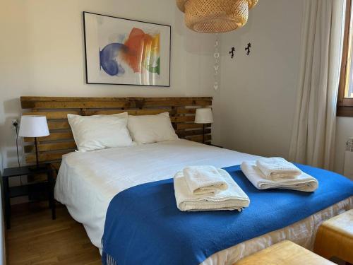 Ένα ή περισσότερα κρεβάτια σε δωμάτιο στο Apartamento Linar l Wifi l Vistas l P & Trastero