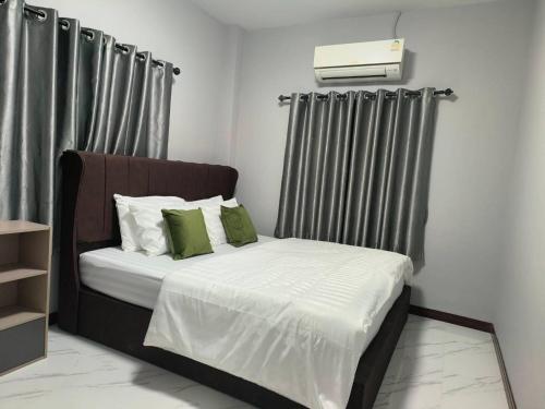 En eller flere senge i et værelse på 784 Pool Villa 2