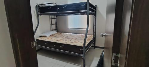 Ένα ή περισσότερα κρεβάτια σε δωμάτιο στο Casa vacacional tonsupa