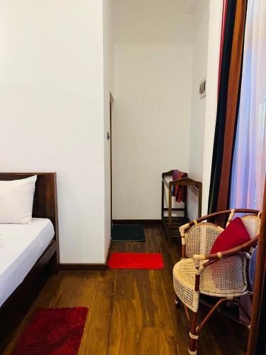 Katil atau katil-katil dalam bilik di Ceylonima Home Stay