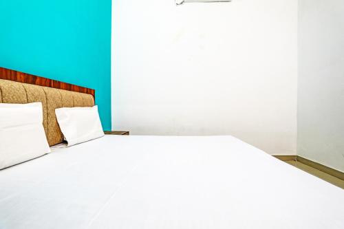 Ένα ή περισσότερα κρεβάτια σε δωμάτιο στο Hotel O PARK'S HOTEL