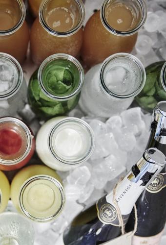 a group of glasses and bottles on ice at Hotel Hans in Copenhagen