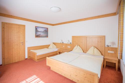 Postel nebo postele na pokoji v ubytování Appartementhaus Elmo Viehhauser KG