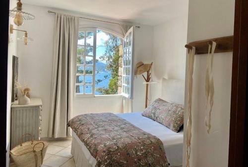 En eller flere senge i et værelse på VILLA, Domaine de l'Ogliastru