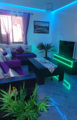 Una televisión o centro de entretenimiento en au cœur de L'orient Marrakech