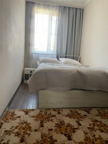 Ένα ή περισσότερα κρεβάτια σε δωμάτιο στο Sis Guest House