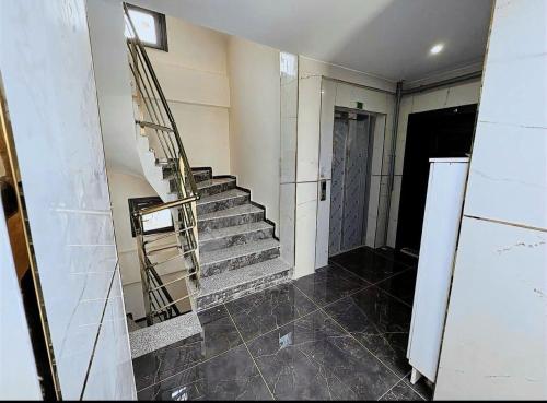 a stairway in a room with a staircase in a building at Link Taksim Hotel in Istanbul