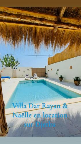 a swimming pool at a villa dat rayanayan and naples vacation location at Villa Dar Rayan & Naelle in Midoun