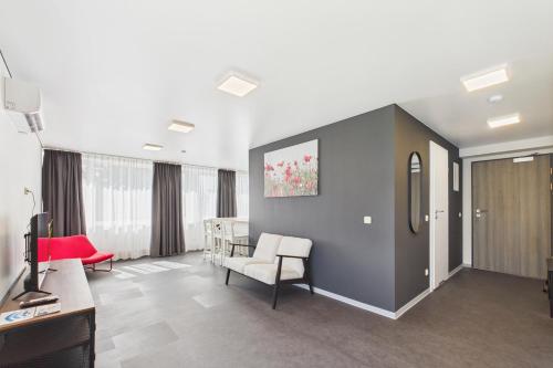 Modern Apartment in Aizkraukleにあるテレビまたはエンターテインメントセンター