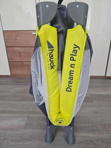 a pair of yellow raincoats on a golf cart at Ehrenfeld - Bright 32m2 Flat in Cologne