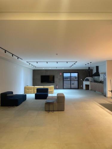 Μια τηλεόραση ή/και κέντρο ψυχαγωγίας στο Apartamento Completo com Piscina, Academia e Salão de festas em São Carlos
