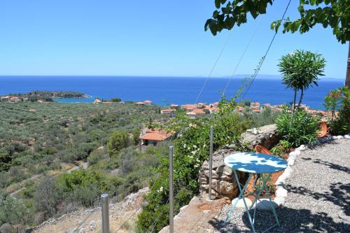 a view of the ocean from a house at Athina's Stone House in Kardamyli in Kardamili