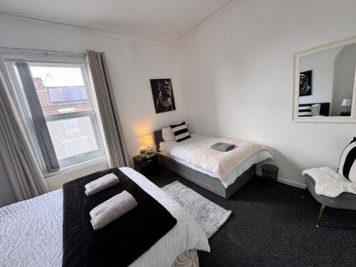 Room 3 Shared House 10 min from Centerにあるベッド