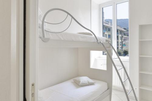 Ένα ή περισσότερα κρεβάτια σε δωμάτιο στο Casa Vico delle Isole by Wonderful Italy