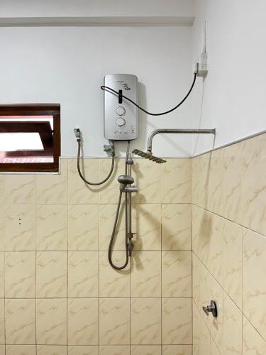 a shower in a bathroom with a shower at Two Bedroom Villa Tangalle in Tangalle