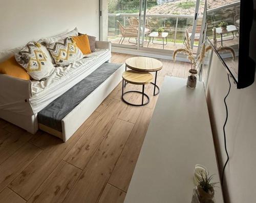 Μια τηλεόραση ή/και κέντρο ψυχαγωγίας στο Apartamento en la Parada 18 de la Mansa - Edificio Mansa Inn I Residence