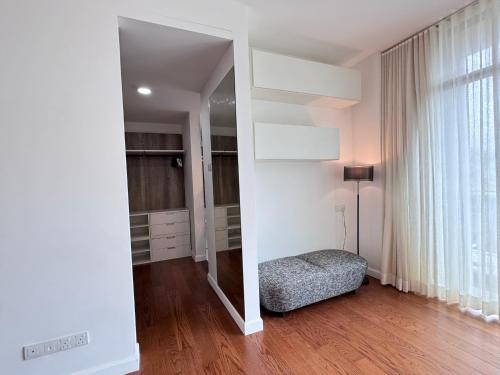 a large mirror in a room with a bed in it at Malibu 2BR Villa - Private Pool Langkawi in Pulau Tepur
