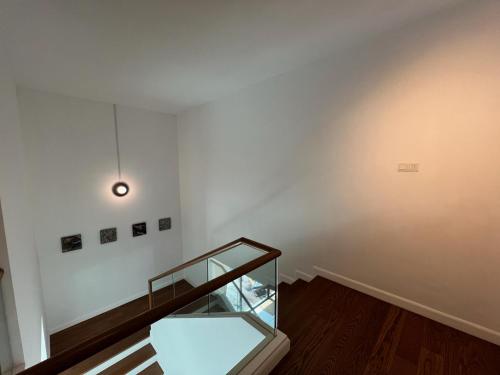 an empty room with a glass case on a wall at Malibu 2BR Villa - Private Pool Langkawi in Pulau Tepur
