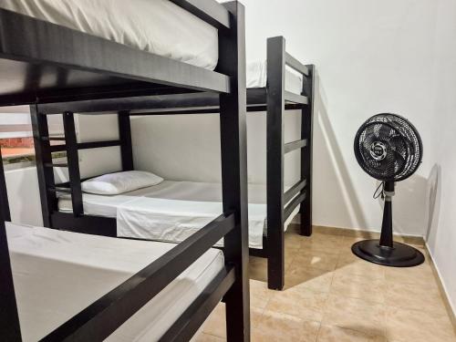 Ένα ή περισσότερα κρεβάτια σε δωμάτιο στο Casa de descanso con Jacuzzi privado - Girardot