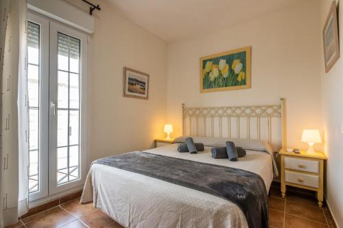 Postel nebo postele na pokoji v ubytování Playa Grande - Playa Punta del Moral PPHG52P15