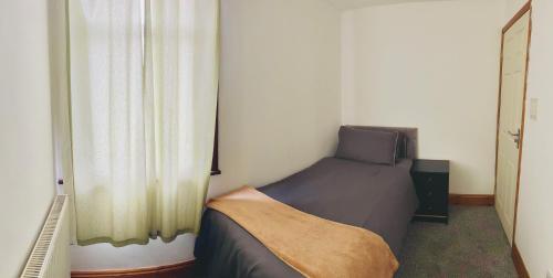 Χώρος καθιστικού στο Wheat Street Four Bedrooms