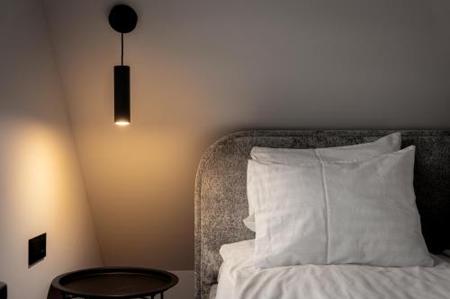 Katil atau katil-katil dalam bilik di Comfort Apartments Palanga