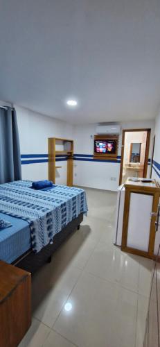 Postel nebo postele na pokoji v ubytování Praieira Pousada&Hostel