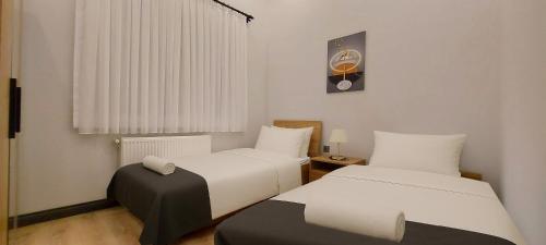 Ένα ή περισσότερα κρεβάτια σε δωμάτιο στο Professionally Maintained, Spacious New Residences Near Lara Beach & Kundu