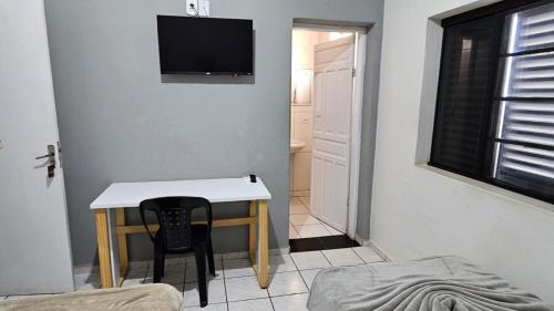 Televisyen dan/atau pusat hiburan di Nômade Hotel