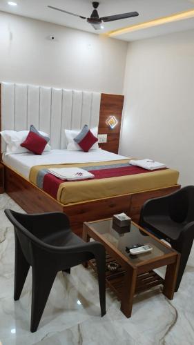 Una cama o camas en una habitación de Nandi residency