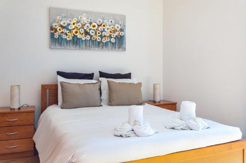 Ένα ή περισσότερα κρεβάτια σε δωμάτιο στο Marina Paradis Bleu